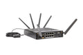 Peplink Balance 310 5G branch router, three-quarter view with antennas